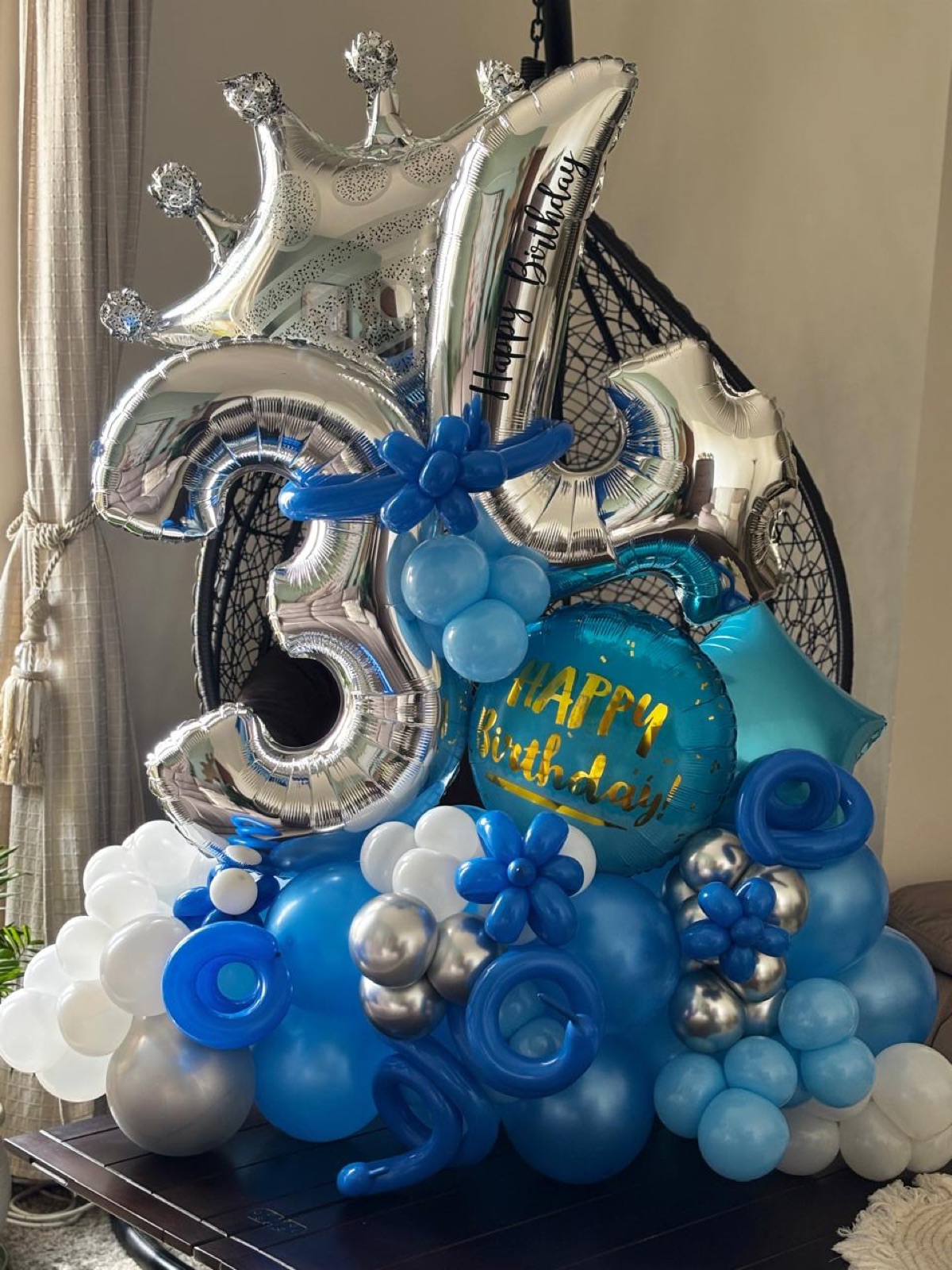 Blue and silver balloon bouquet